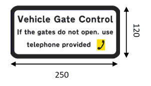 A rectangular sign with wording “ Vehicle Gate Control. If gates do not open, use telephone provided.” with diagram of a telephone