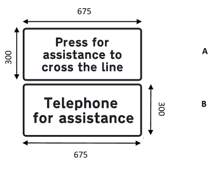 Two Black rectangular signs that read: A – Press for assistance to cross the line, and B – Telephone for assistance